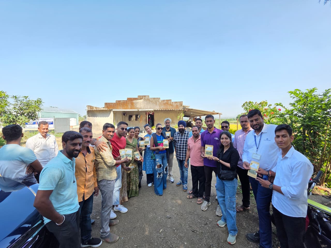 Farmers and community members gathered in a Dindori vineyard